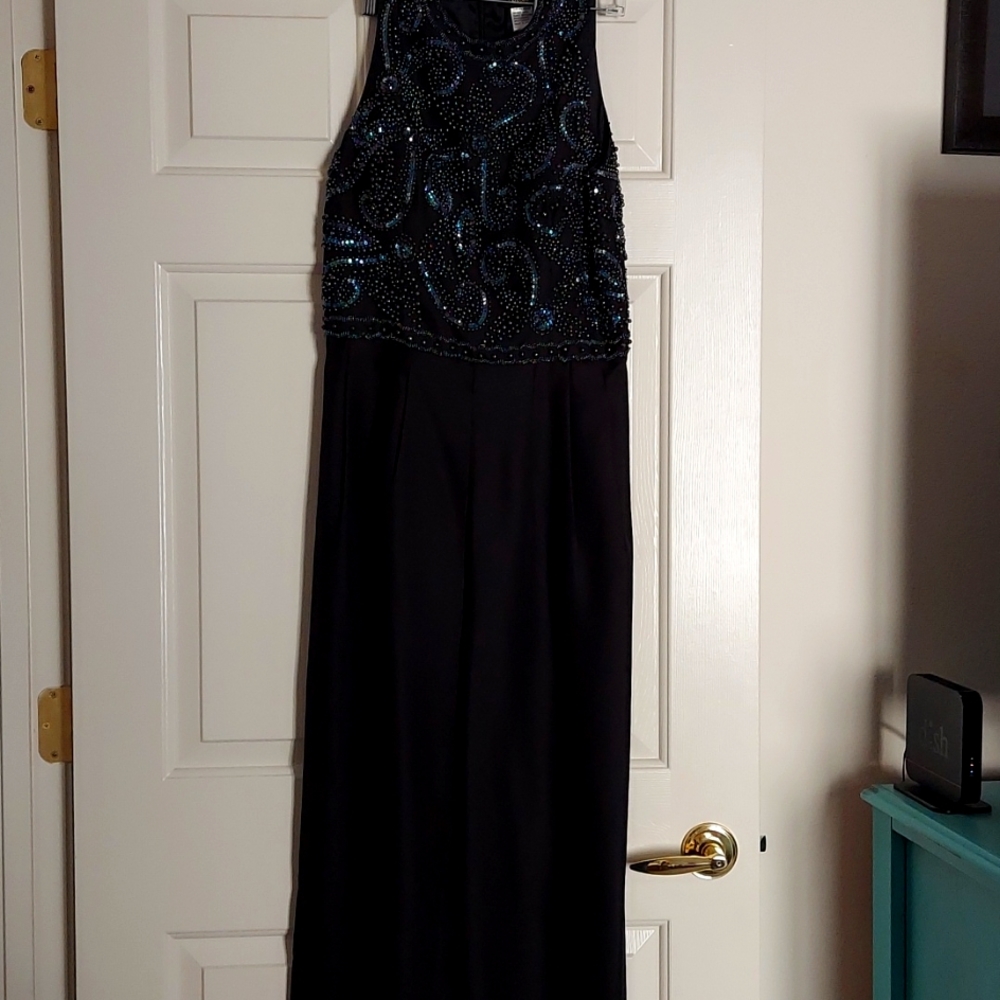 Formal one piece sleeveless pants suit. Interlude brand, iridescent beaded top.
